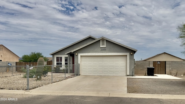 view of front of home featuring a garage