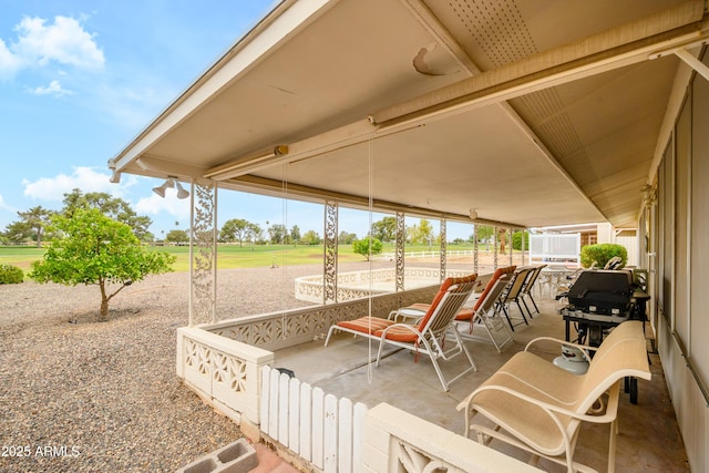 15430 N Bowling Green Dr, Sun City, AZ 85351 - view of patio with a porch and view of golf course