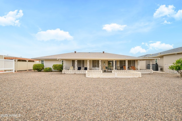 15430 N Bowling Green Dr, Sun City, AZ 85351 - rear view of house with central air condition unit and a porch