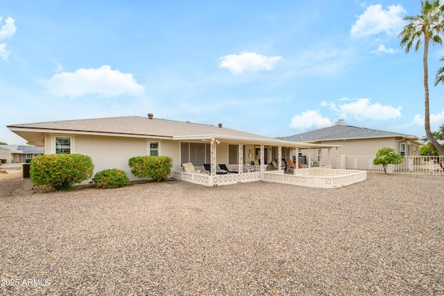 15430 N Bowling Green Dr, Sun City, AZ 85351 - rear view of property featuring fence and a patio