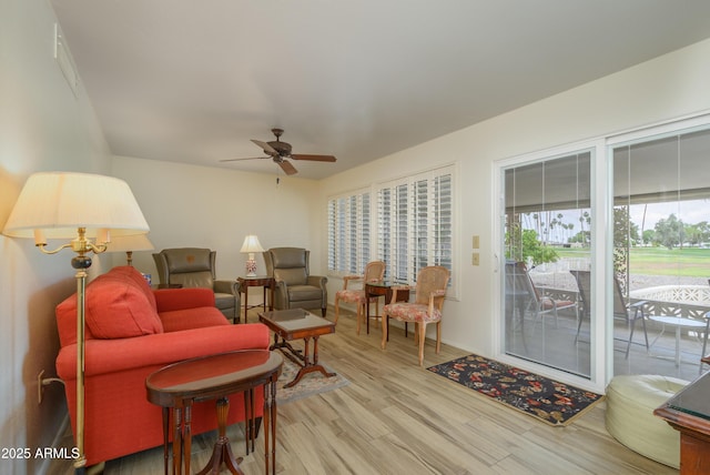 15430 N Bowling Green Dr, Sun City, AZ 85351 - living area featuring wood finished floors and a ceiling fan
