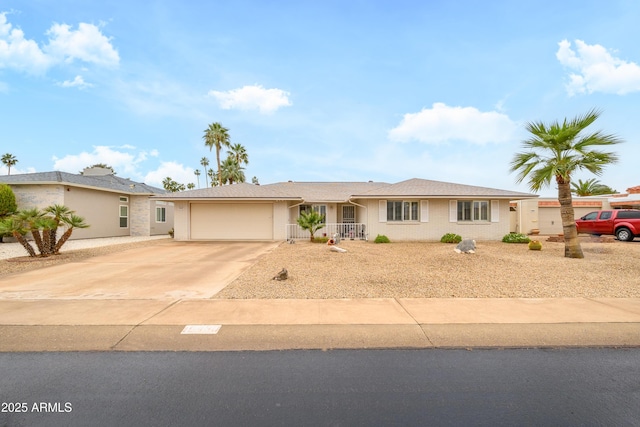 15430 N Bowling Green Dr, Sun City, AZ 85351 - ranch-style home with a garage and driveway