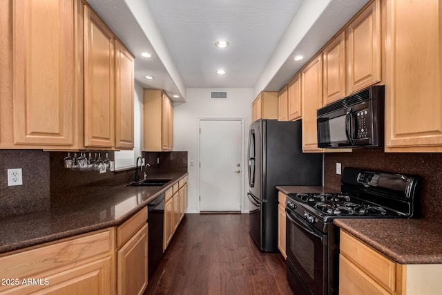 6510 S Hazelton Ln Unit 101, Tempe, AZ 85283 - kitchen featuring black appliances, light brown cabinetry, dark wood-style flooring, recessed lighting, and tasteful backsplash