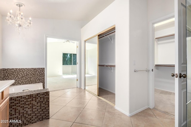 6510 S Hazelton Ln Unit 101, Tempe, AZ 85283 - full bathroom with a walk in closet and tile patterned flooring