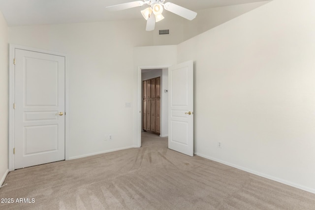 6510 S Hazelton Ln Unit 101, Tempe, AZ 85283 - unfurnished bedroom with light colored carpet, vaulted ceiling, and ceiling fan