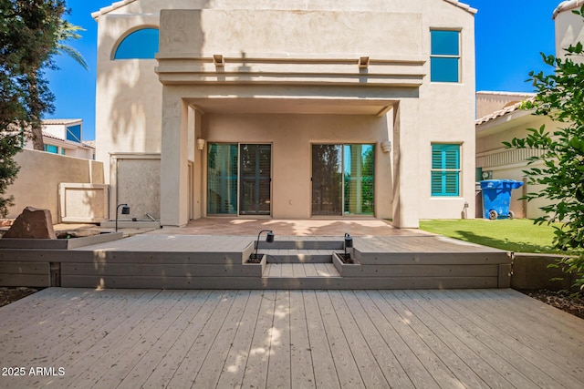 6510 S Hazelton Ln Unit 101, Tempe, AZ 85283 - back of property with a deck and stucco siding