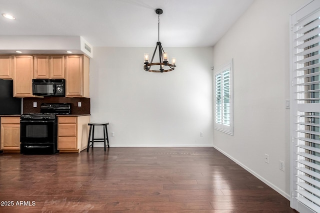 6510 S Hazelton Ln Unit 101, Tempe, AZ 85283 - kitchen featuring black appliances, light brown cabinets, a chandelier, dark countertops, and recessed lighting