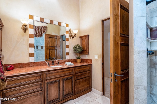 bathroom with vanity and tile patterned floors