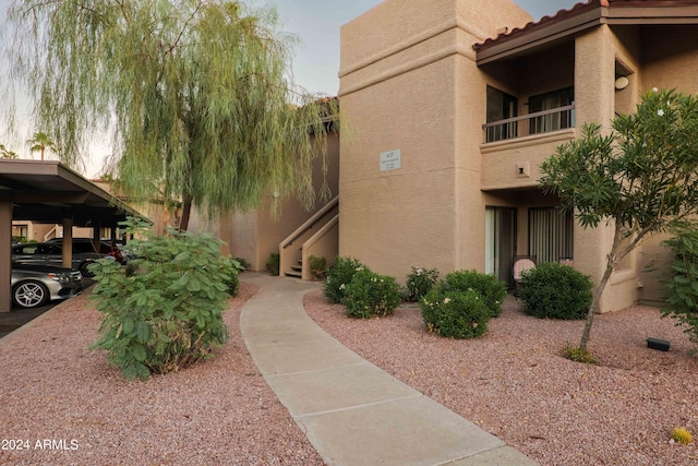 view of property exterior at dusk