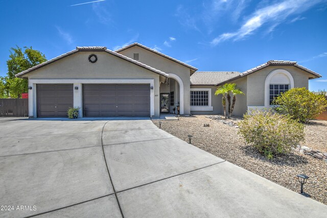 view of front of property with a garage