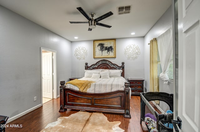 bedroom featuring ceiling fan and hardwood / wood-style floors