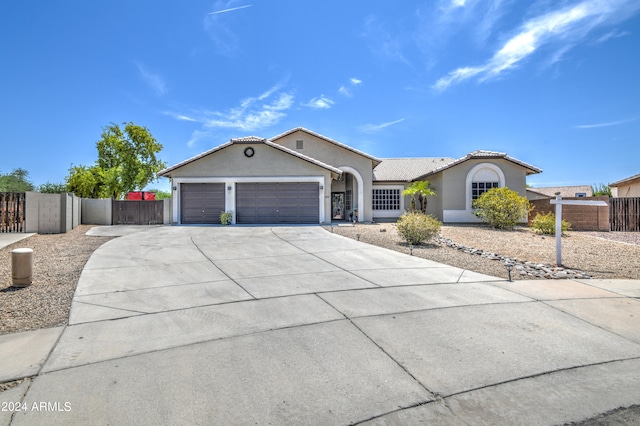 ranch-style home with a garage