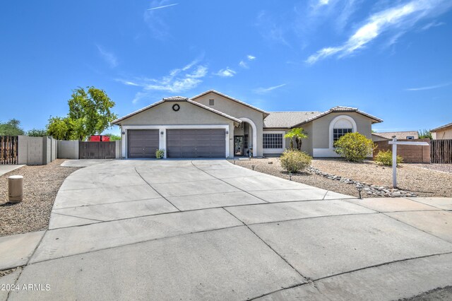 view of front of home with a garage