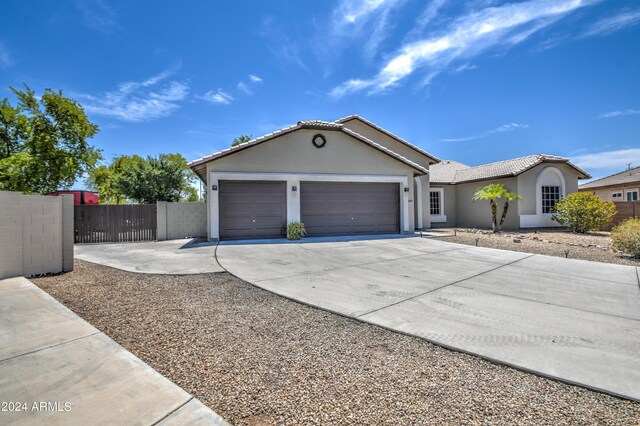 ranch-style house with a garage