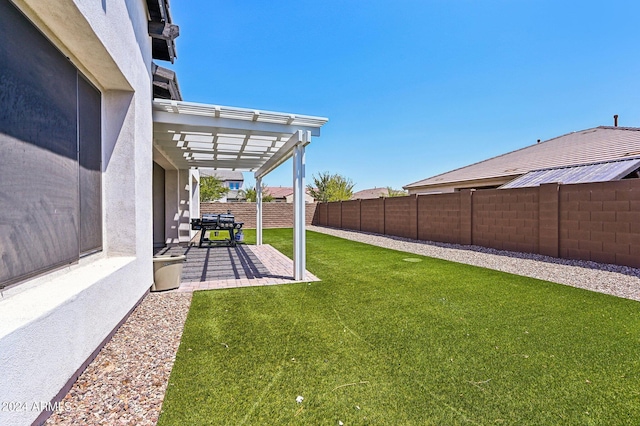 view of yard with a patio, fence, and a pergola