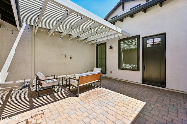 view of patio / terrace with a pergola and an outdoor hangout area