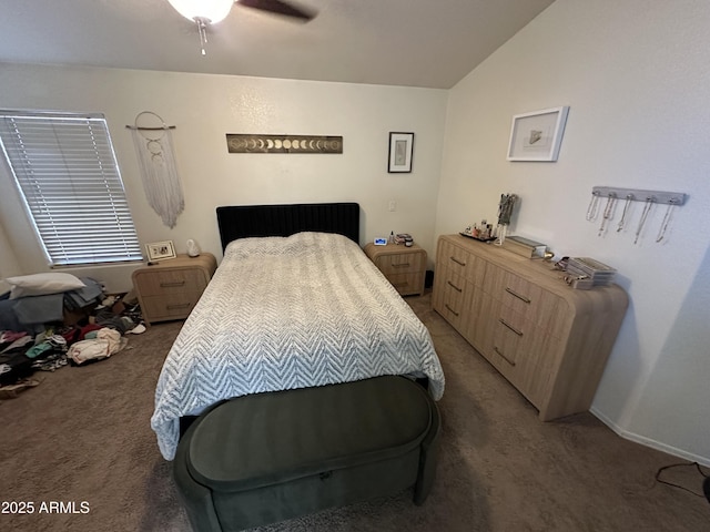 8673 W Palm Ln, Phoenix, AZ 85037 - bedroom with carpet flooring, vaulted ceiling, and a ceiling fan