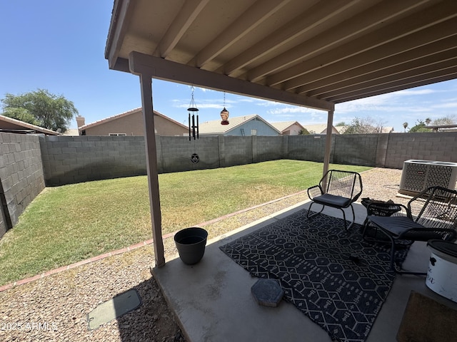 8673 W Palm Ln, Phoenix, AZ 85037 - fenced backyard featuring a patio area