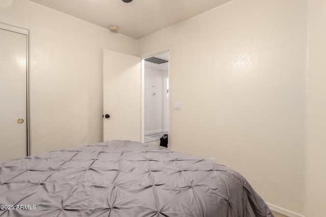 8673 W Palm Ln, Phoenix, AZ 85037 - bedroom with baseboards and a closet