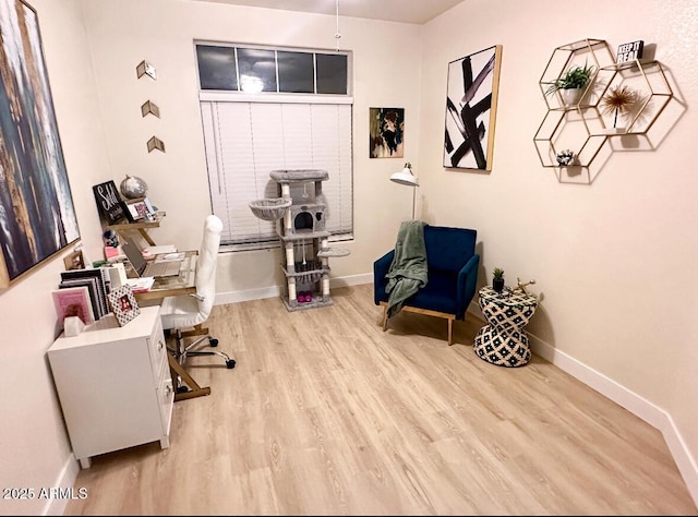 8673 W Palm Ln, Phoenix, AZ 85037 - office area featuring wood finished floors and baseboards