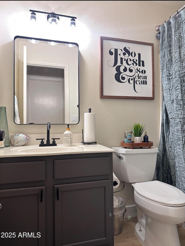8673 W Palm Ln, Phoenix, AZ 85037 - bathroom with vanity and a shower with shower curtain