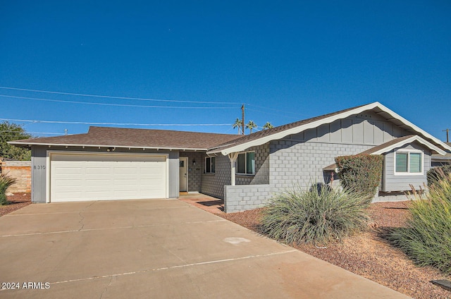 single story home with a garage