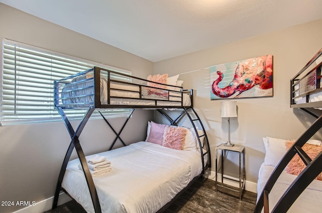 bedroom featuring hardwood / wood-style floors