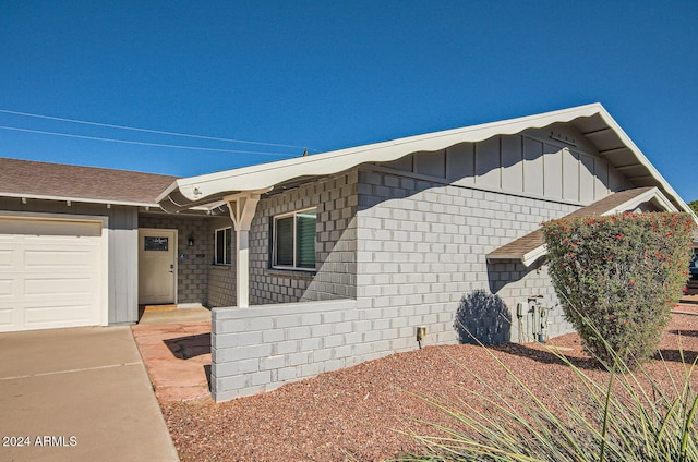 exterior space featuring a garage