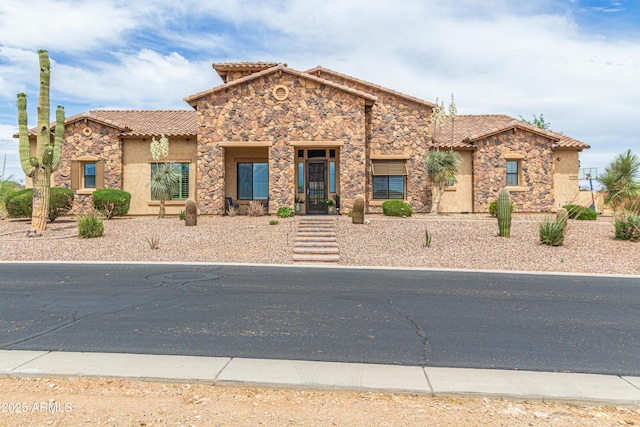 2255 N Hillridge, Mesa, AZ 85207 - mediterranean / spanish house with stone siding, a tiled roof, and stucco siding
