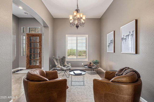 2255 N Hillridge, Mesa, AZ 85207 - sitting room with arched walkways, a chandelier, and baseboards