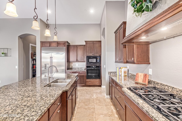 2255 N Hillridge, Mesa, AZ 85207 - kitchen featuring black appliances, wall chimney range hood, a sink, arched walkways, and light stone countertops