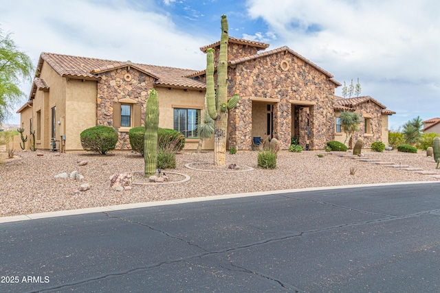 2255 N Hillridge, Mesa, AZ 85207 - mediterranean / spanish home with stucco siding, stone siding, and a tiled roof