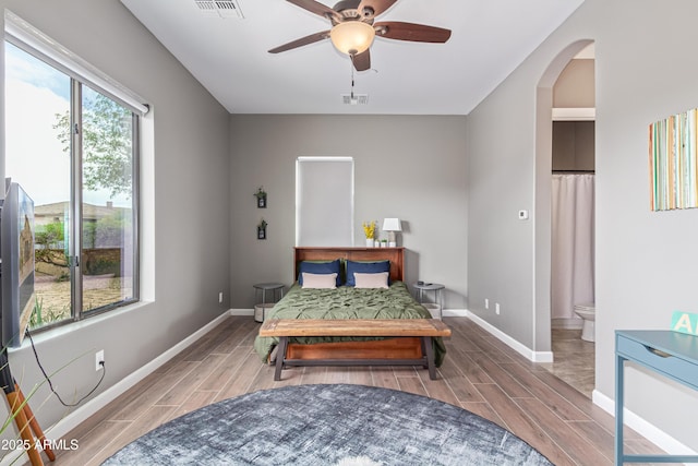 2255 N Hillridge, Mesa, AZ 85207 - bedroom with wood finish floors, arched walkways, baseboards, and a ceiling fan