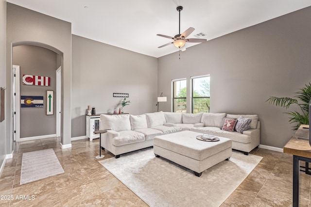 2255 N Hillridge, Mesa, AZ 85207 - living room featuring ceiling fan, baseboards, arched walkways, and high vaulted ceiling