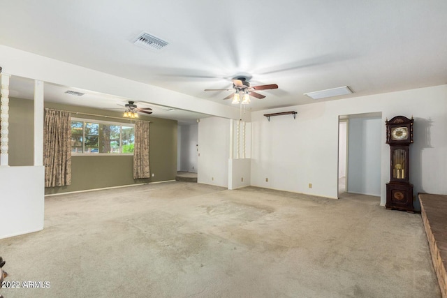 unfurnished living room with light carpet and ceiling fan