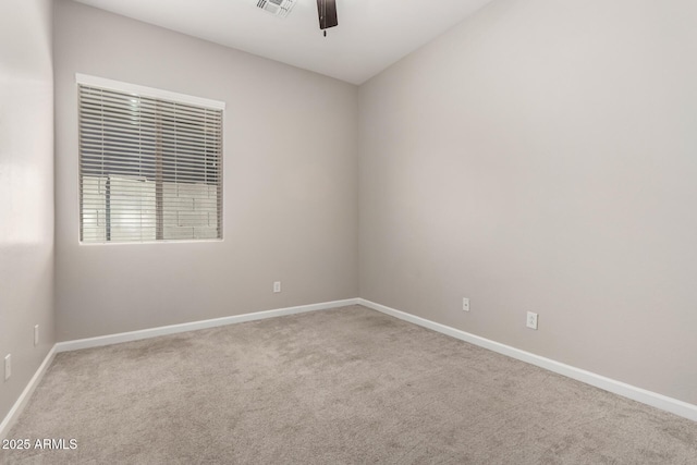 2409 W Red Range Way, Phoenix, AZ 85085 - spare room featuring a ceiling fan, carpet flooring, and baseboards