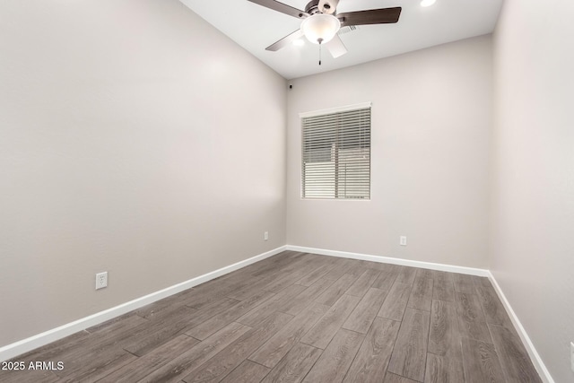 2409 W Red Range Way, Phoenix, AZ 85085 - spare room with ceiling fan, wood finished floors, and baseboards