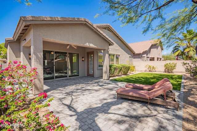 2409 W Red Range Way, Phoenix, AZ 85085 - rear view of house featuring a patio area, ceiling fan, stucco siding, and a tiled roof