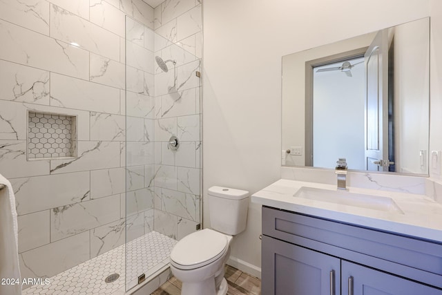 14914 E Zapata Dr, Fountain Hills, AZ 85268 - bathroom featuring a stall shower, toilet, vanity, and wood finished floors