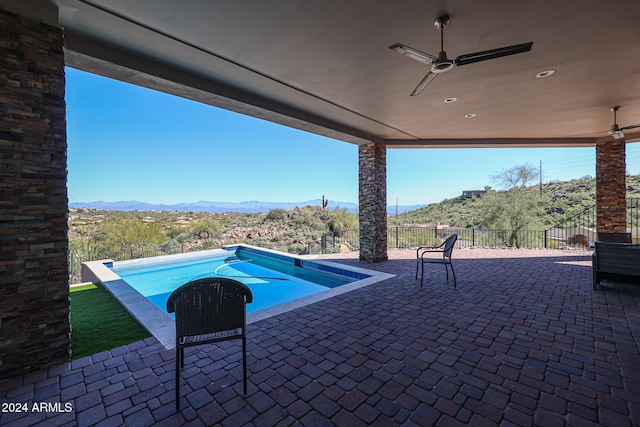 14914 E Zapata Dr, Fountain Hills, AZ 85268 - view of pool with a ceiling fan, a mountain view, a patio area, and fence