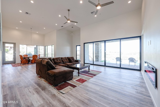 14914 E Zapata Dr, Fountain Hills, AZ 85268 - living room with a high ceiling, a ceiling fan, recessed lighting, and light wood finished floors