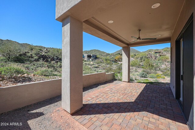 14914 E Zapata Dr, Fountain Hills, AZ 85268 - view of patio / terrace with a ceiling fan and a mountain view