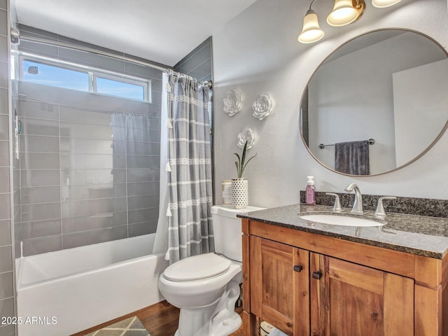 full bath with toilet, shower / bath combo with shower curtain, wood finished floors, and vanity