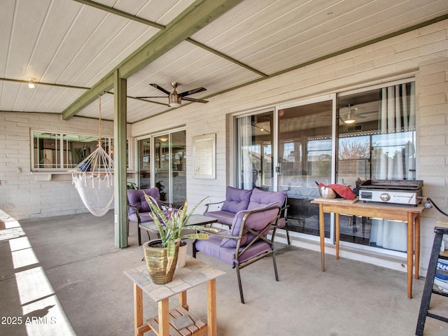 view of patio / terrace with ceiling fan and an outdoor hangout area