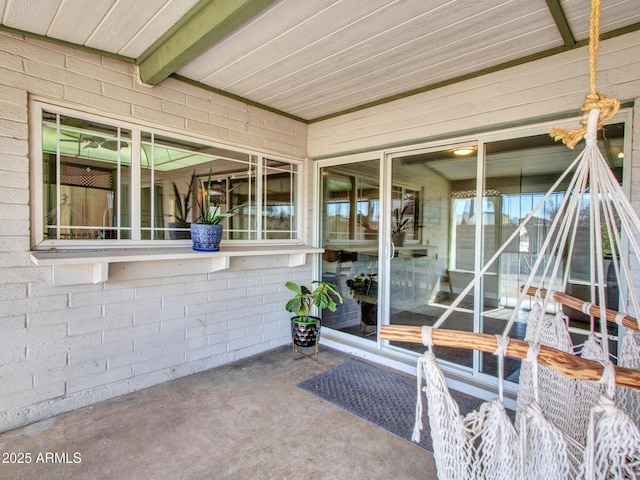 entrance to property with a patio