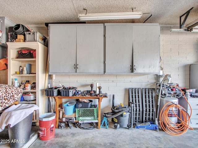 garage featuring concrete block wall