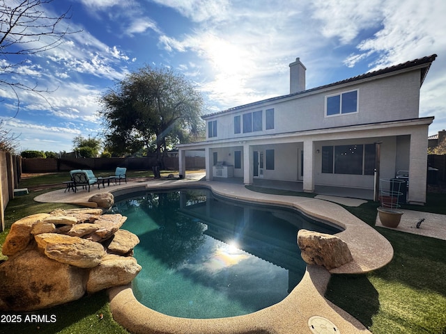 view of pool with a fenced in pool, a fenced backyard, and a patio