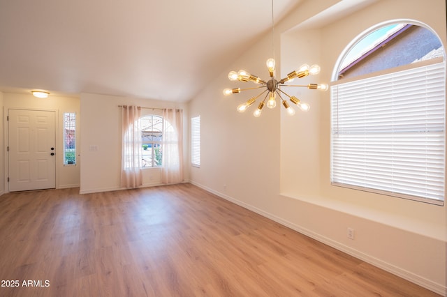 866 W Geronimo St, Chandler, AZ 85225 - entrance foyer featuring a chandelier, light wood-style flooring, baseboards, and lofted ceiling