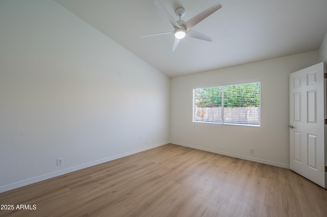 866 W Geronimo St, Chandler, AZ 85225 - spare room with light wood-type flooring, lofted ceiling, a ceiling fan, and baseboards