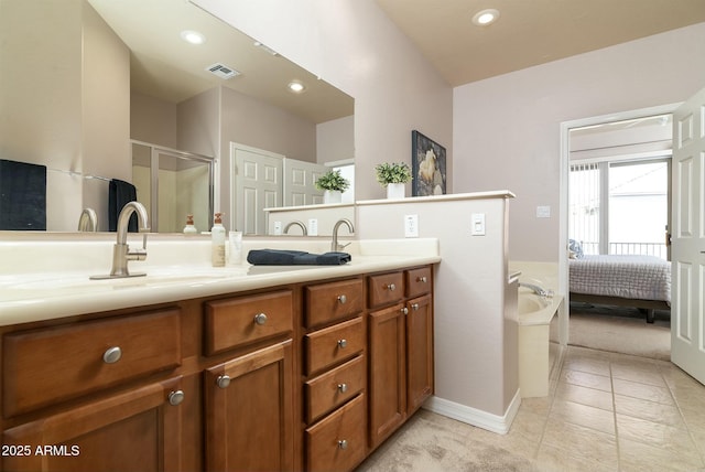 bathroom featuring vanity, tile patterned flooring, and shower with separate bathtub